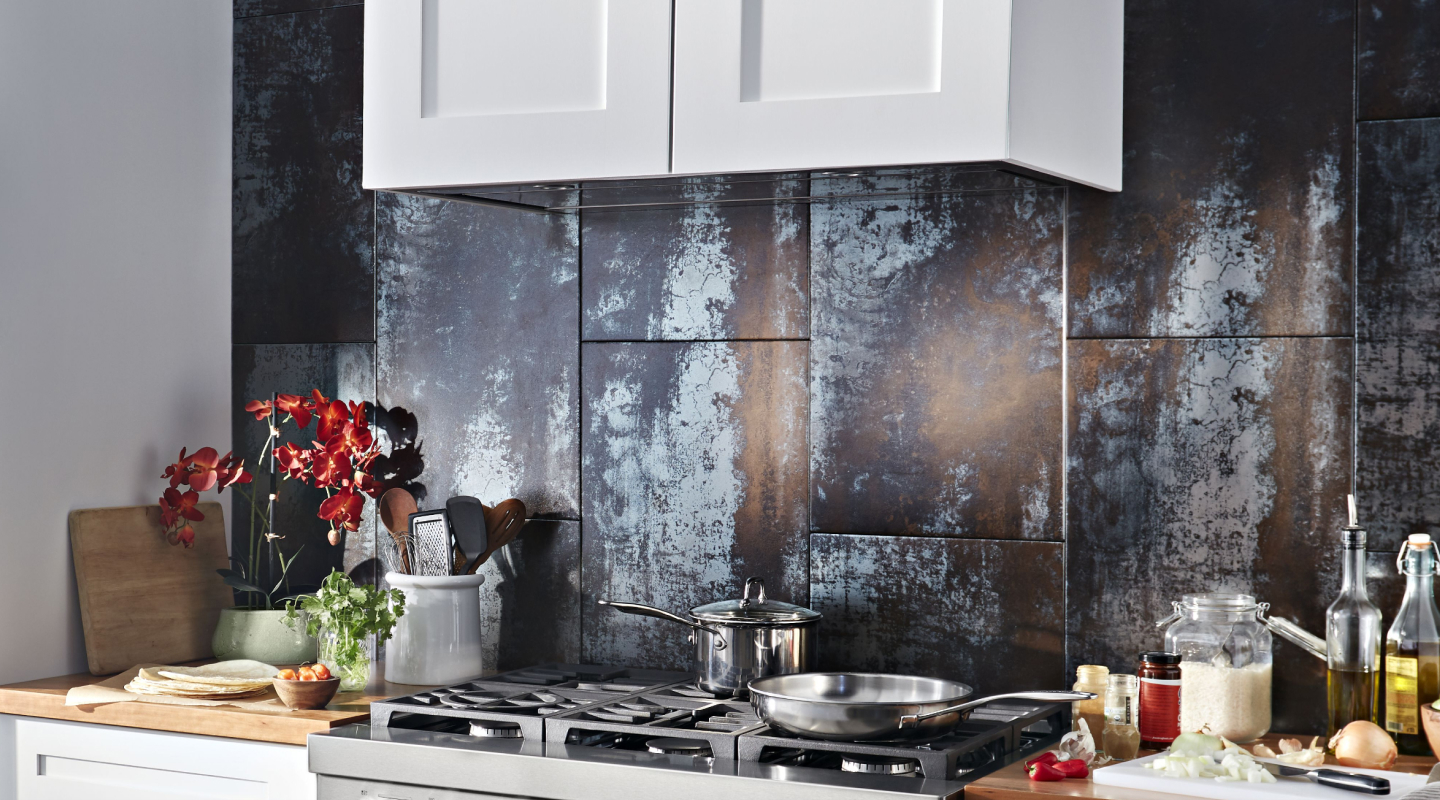 A range hood liner with ingredients on a counter nearby. A range hood liner with ingredients on a counter nearby.